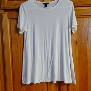 Eileen Fisher white A-line tee. XS. Super condition. Seem runs down in back...